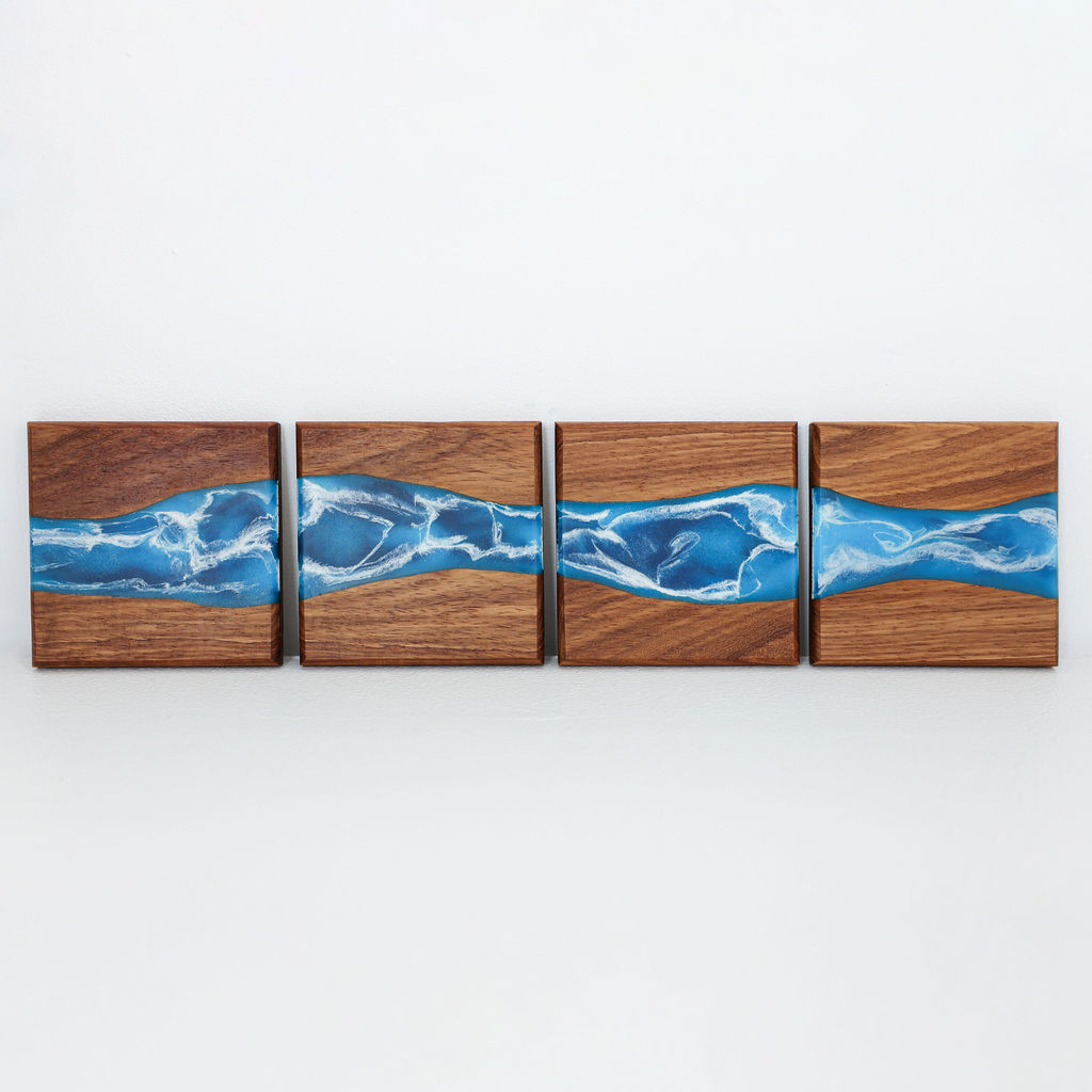 Front view of handcrafted Tidal coaster set with inlaid blue ocean resin wave design