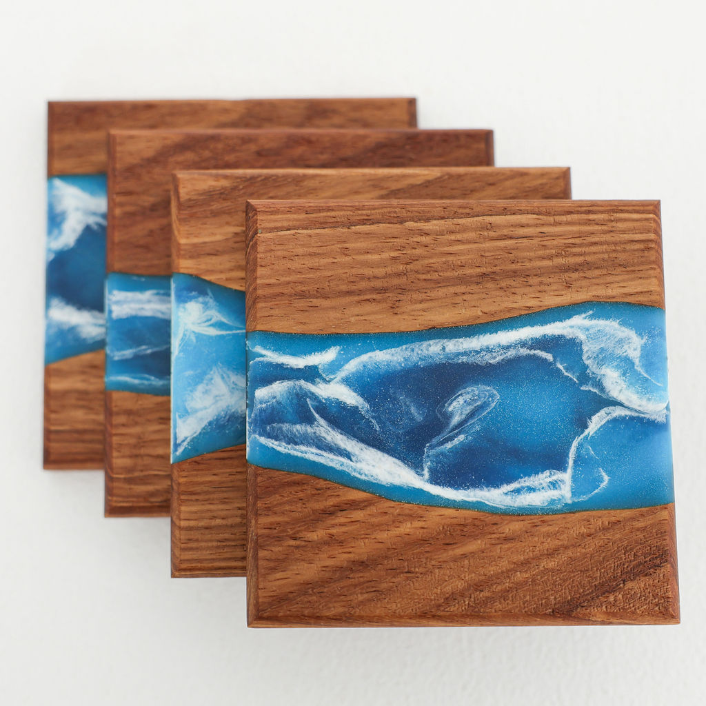 Front view of handcrafted Tidal coaster set with inlaid blue ocean resin wave design