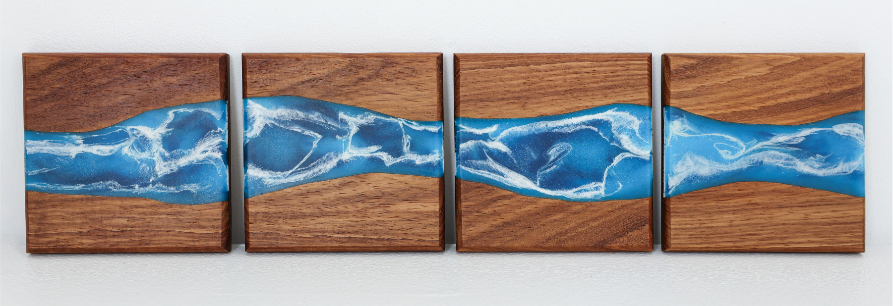 Ocean resin coasters on kiaat wood